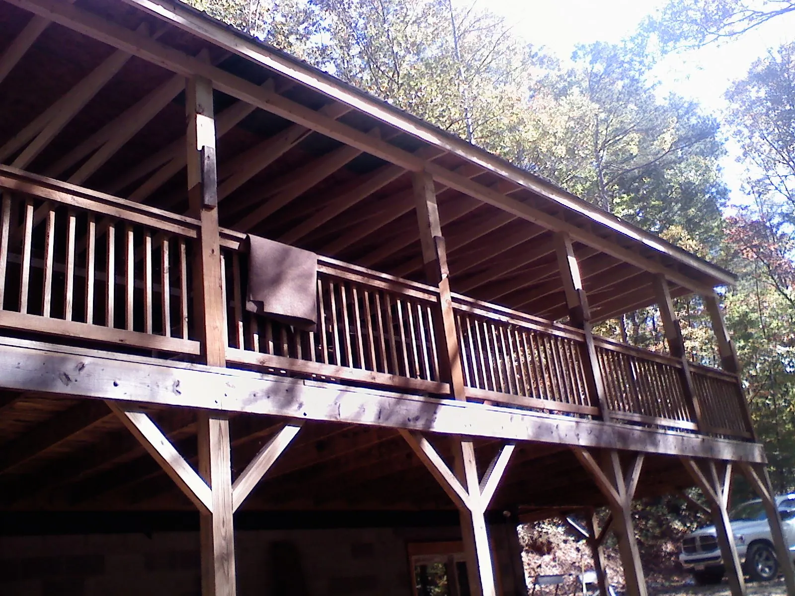 Timber framing under a new elevated porch and deck — Roof Leak Repair in South Haven by Roofing Brothers